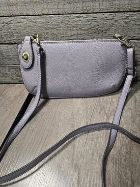Joy Susan lavender pebbled faux leather mini crossbody bag.